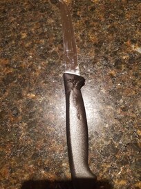 Grease on knife handle