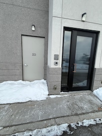 Snow against stair exit 1