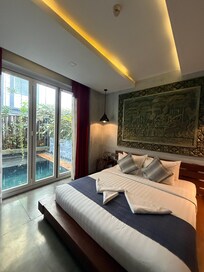 Bedroom with pool view