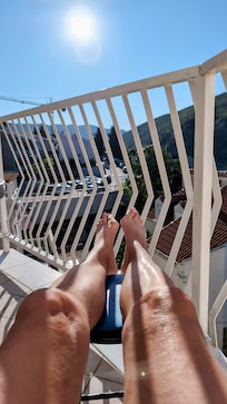 Relaxing in the sun on the balcony...