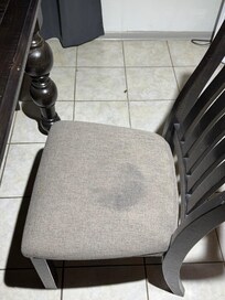 Stains on the dinging room chairs and the table itself felt sticky.