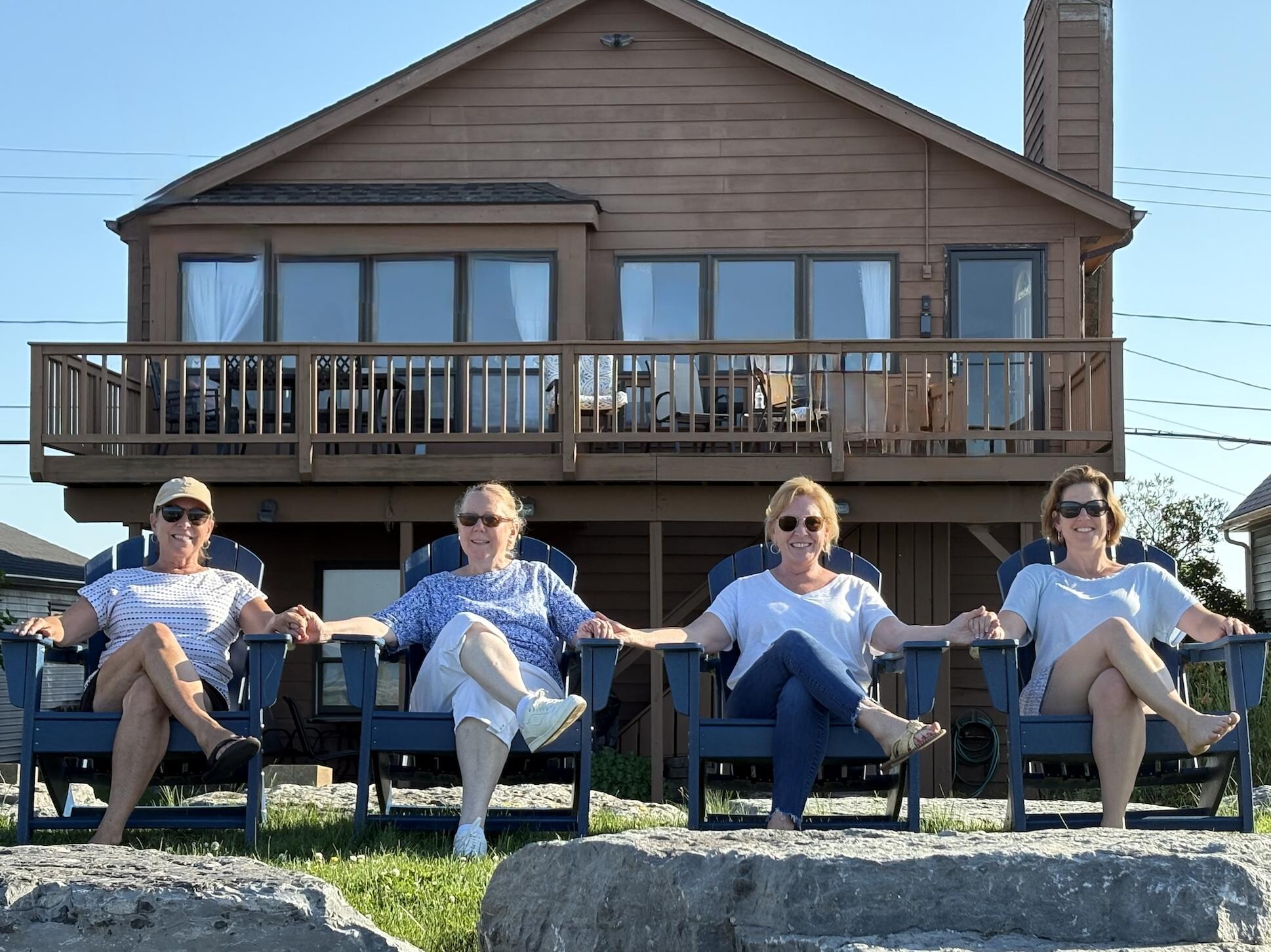 A picture of my sisters and I aken from the back of this cute cottage