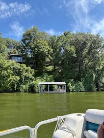 View of dock and house from lake