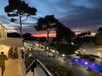 Sunset from Hotel terrace, facing towards the beach.