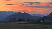 Zonsondergang van het balkon van de kamer
