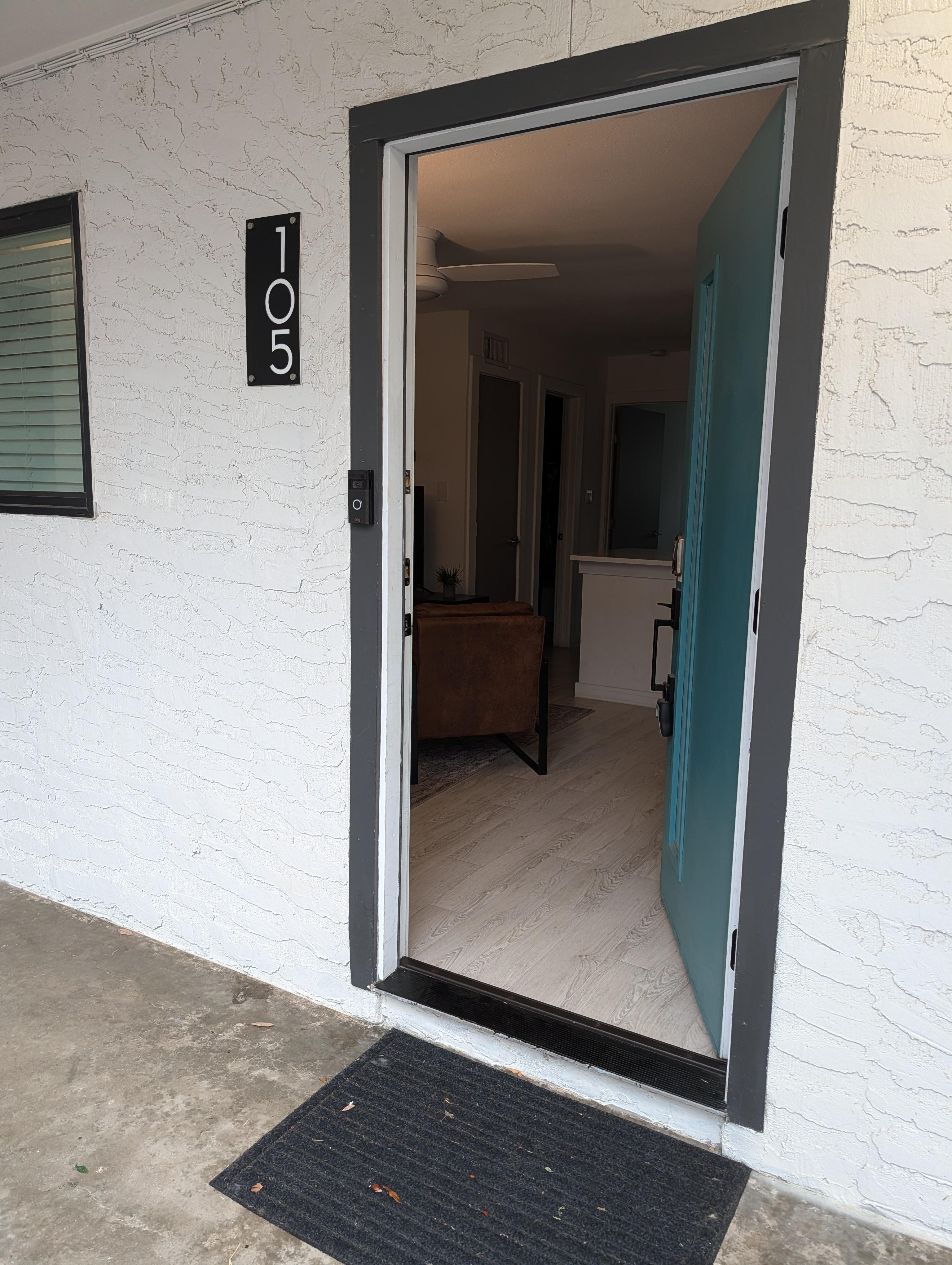 No shoes inside but no rack in or out.