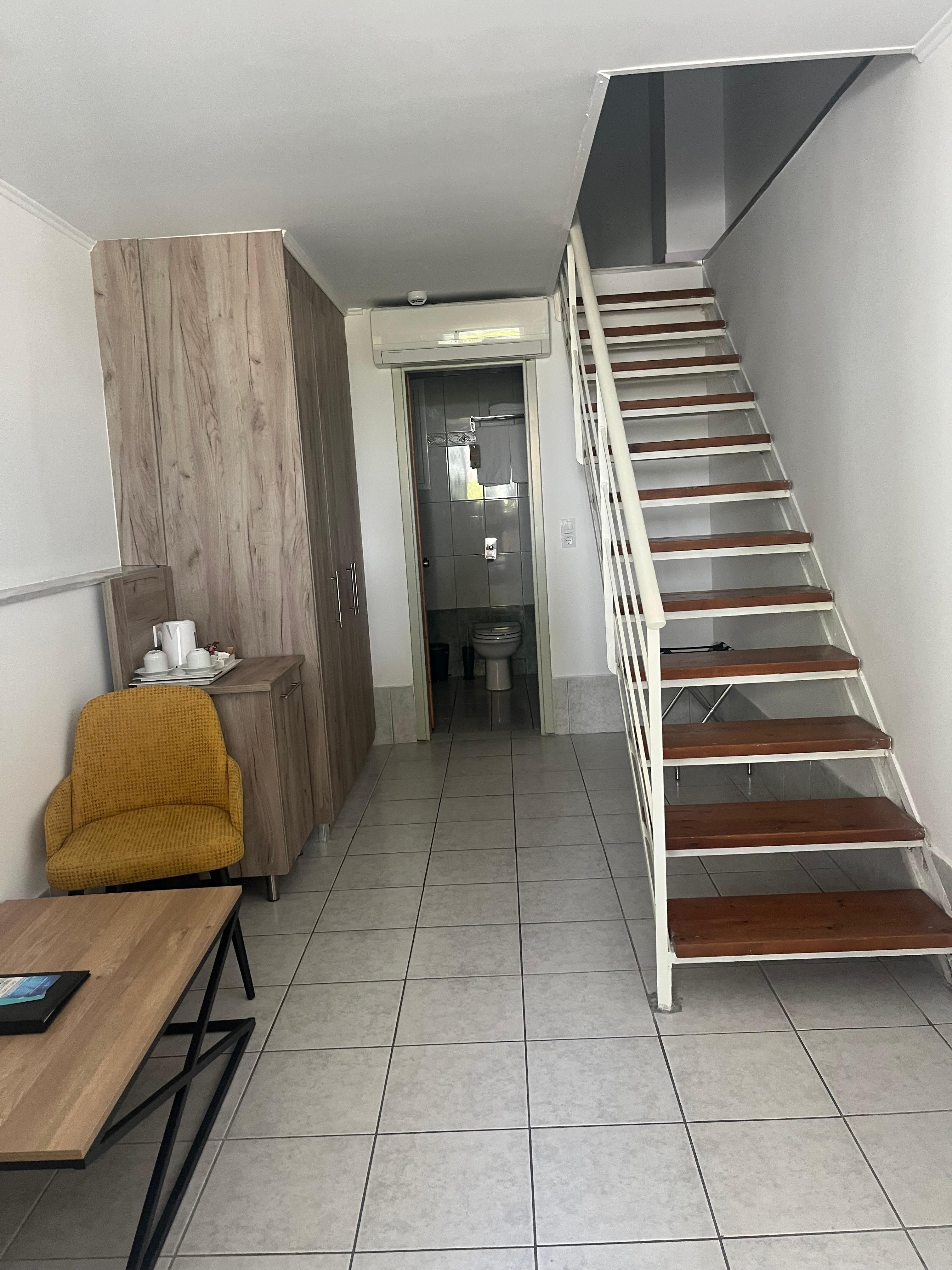 Chambre en duplex sur rez de chaussée 