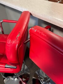 Scuffed up chairs.