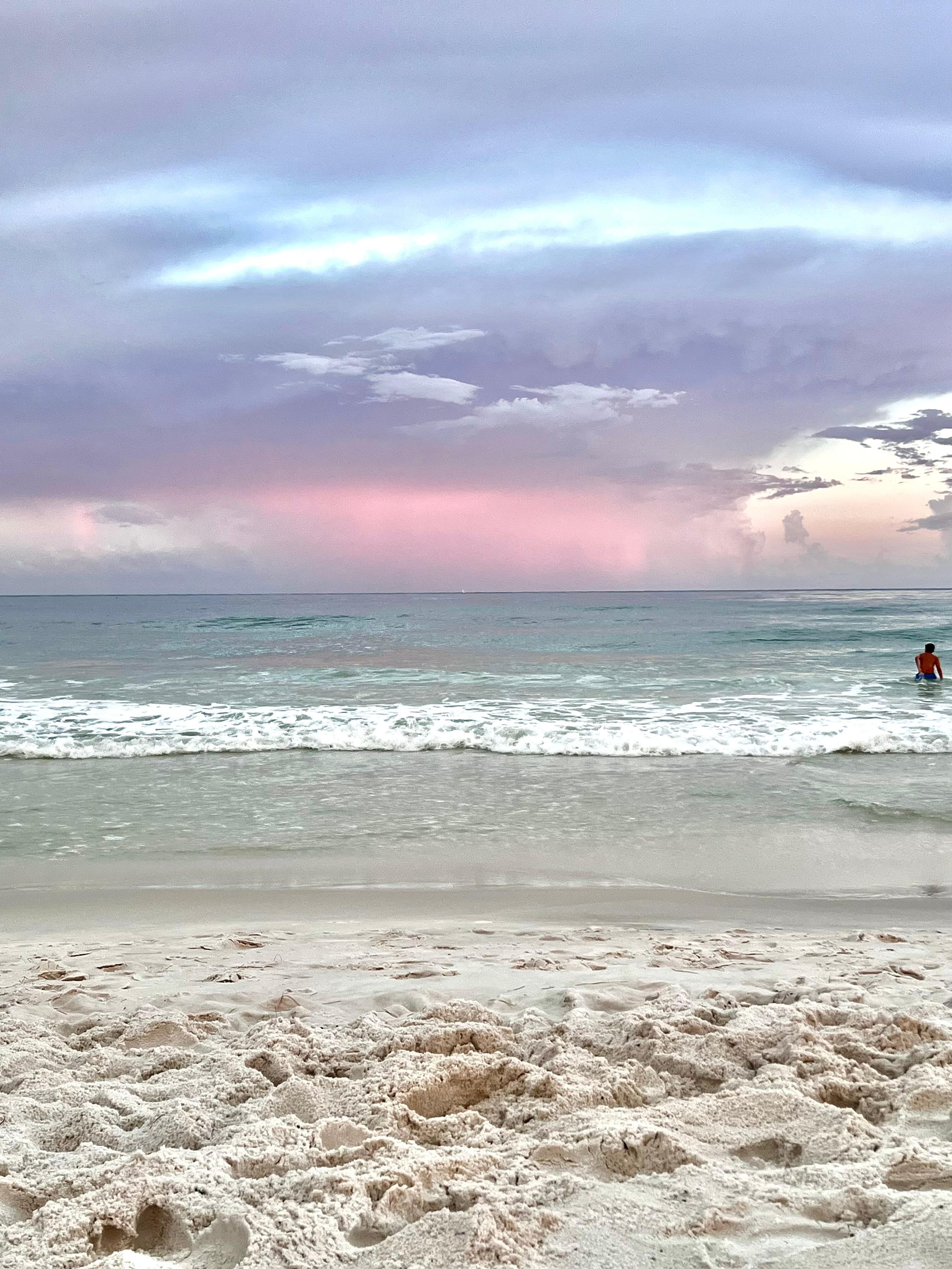 The property’s beach at sunset. 