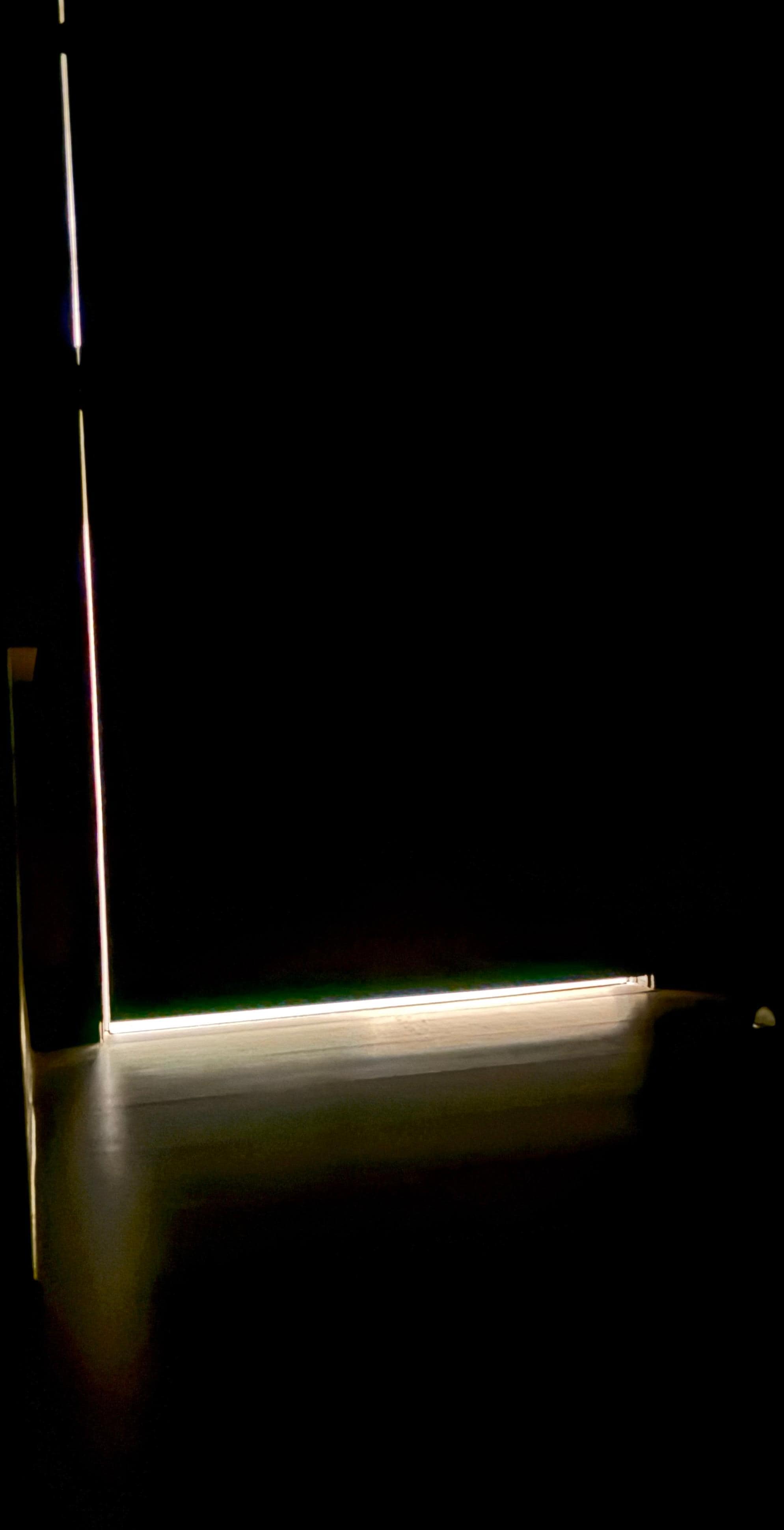 Huge crack around the door let light flood in