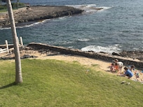 Looking down at kids playing on the lawn from the deck