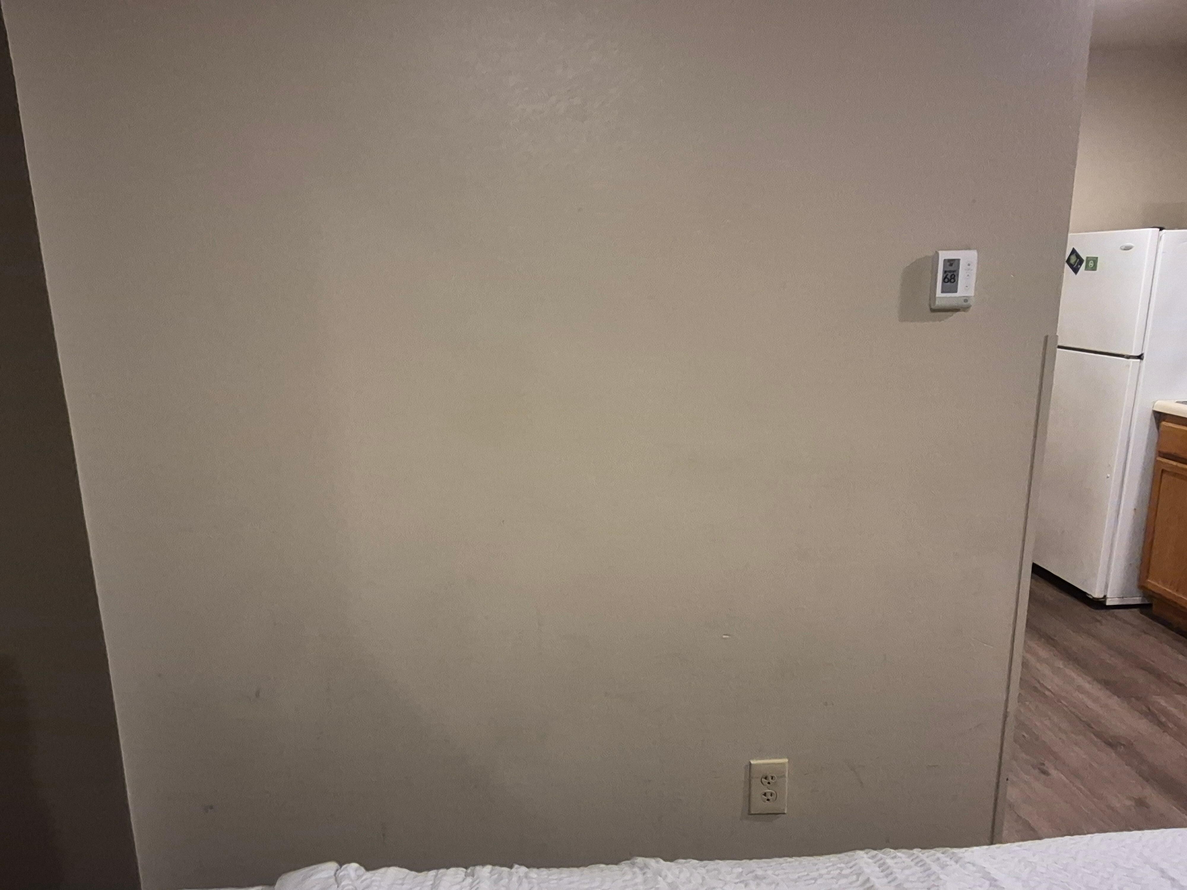 Had to wipe down wall had stuff smeared streaked on it.  