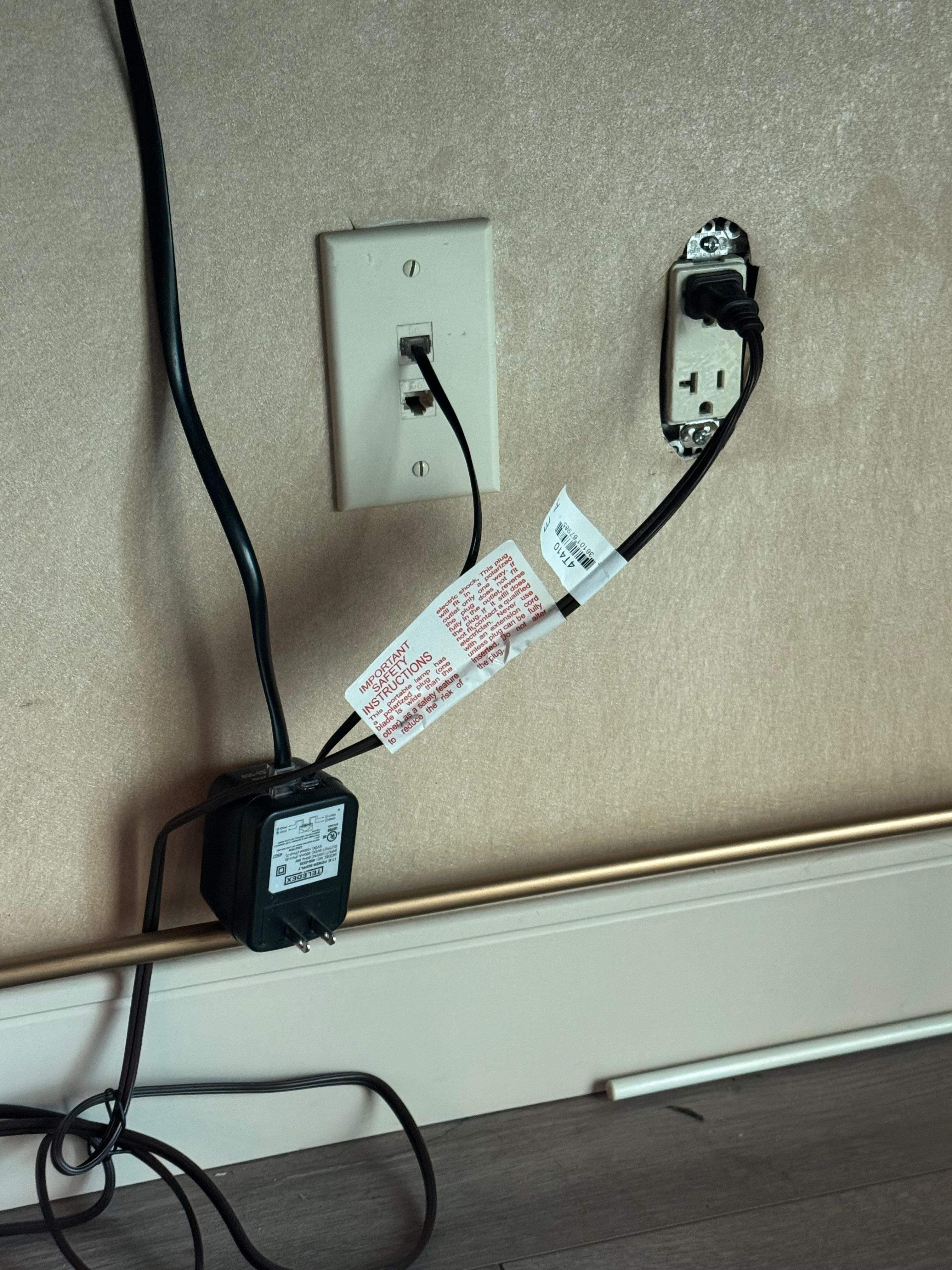 Guess this is why the phone wasn’t working, no outlet cover plate either.