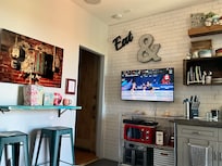 A portion of the kitchen neatly decorated.