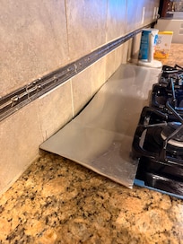Home installation of stove top. Uneven and hard to cook on.