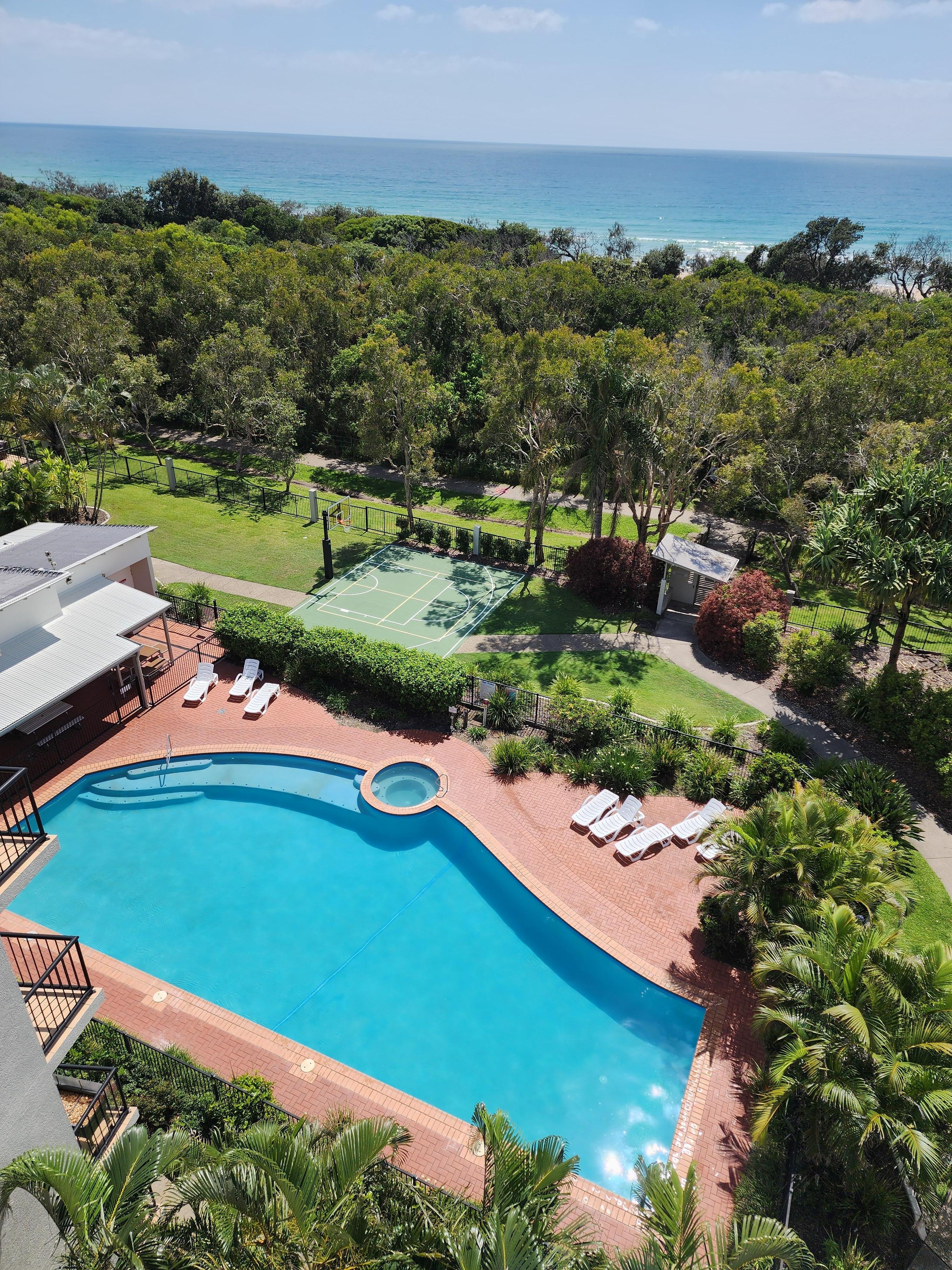 View over looking the Ocean, pool and resort gardens.