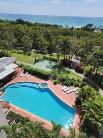 View over looking the Ocean, pool and resort gardens.
