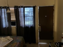 Widow was cracked, door gap was huge, curtain didn’t keep out any light.
