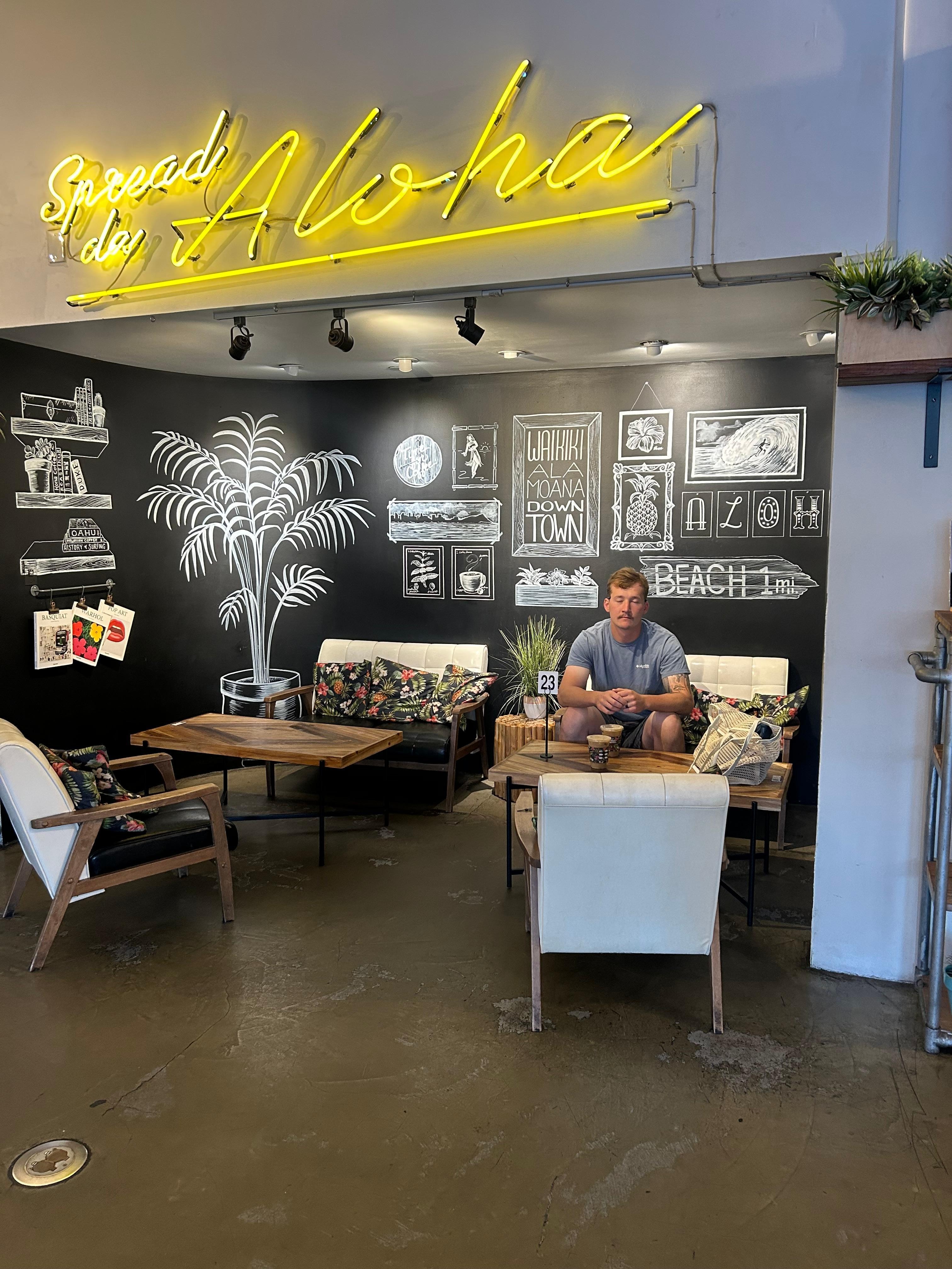 The aroma cafe where you eat breakfast and get coffee, connects with open concept to the pool