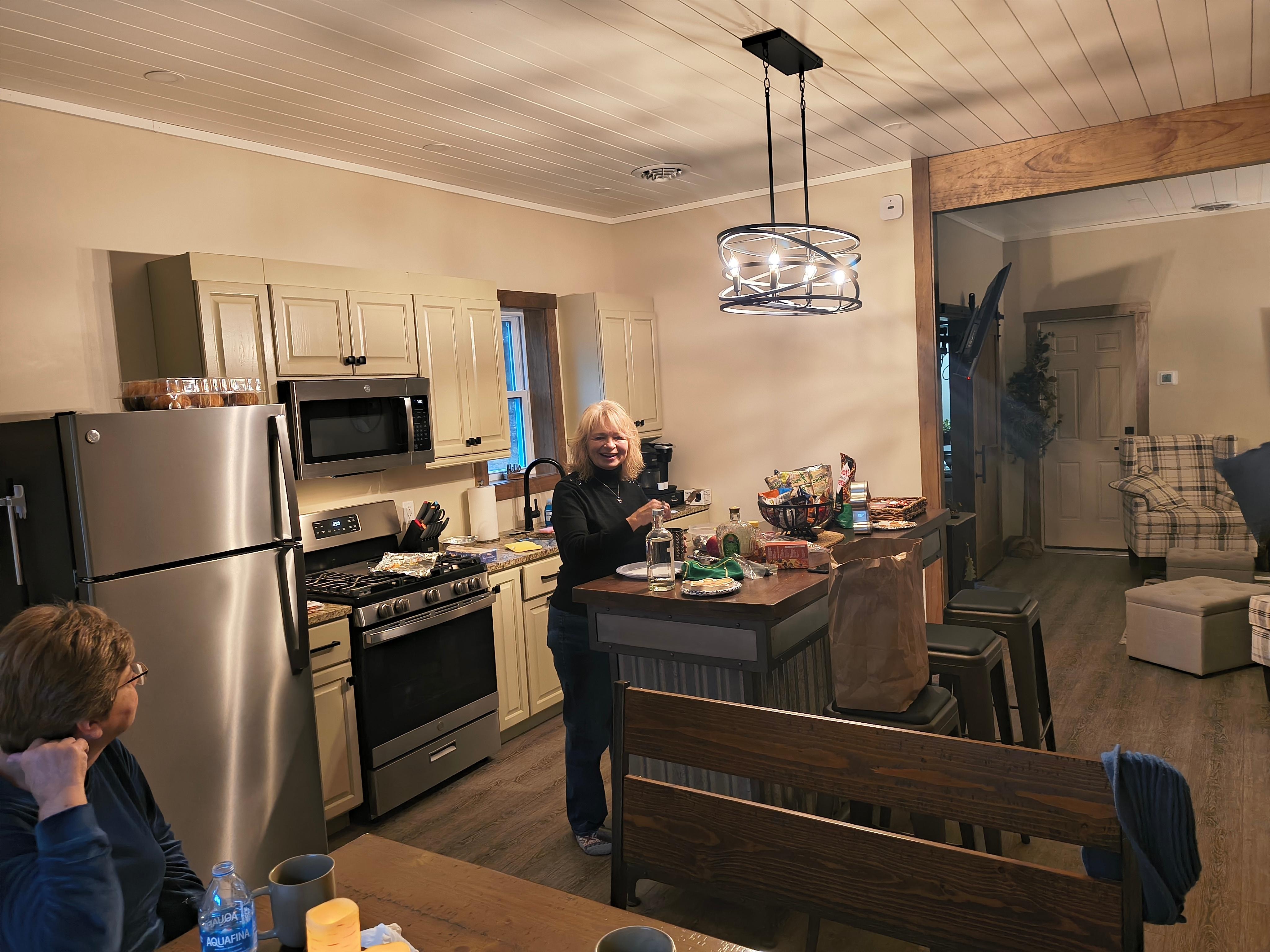 Kitchen and dining spaces are roomy and well stocked.