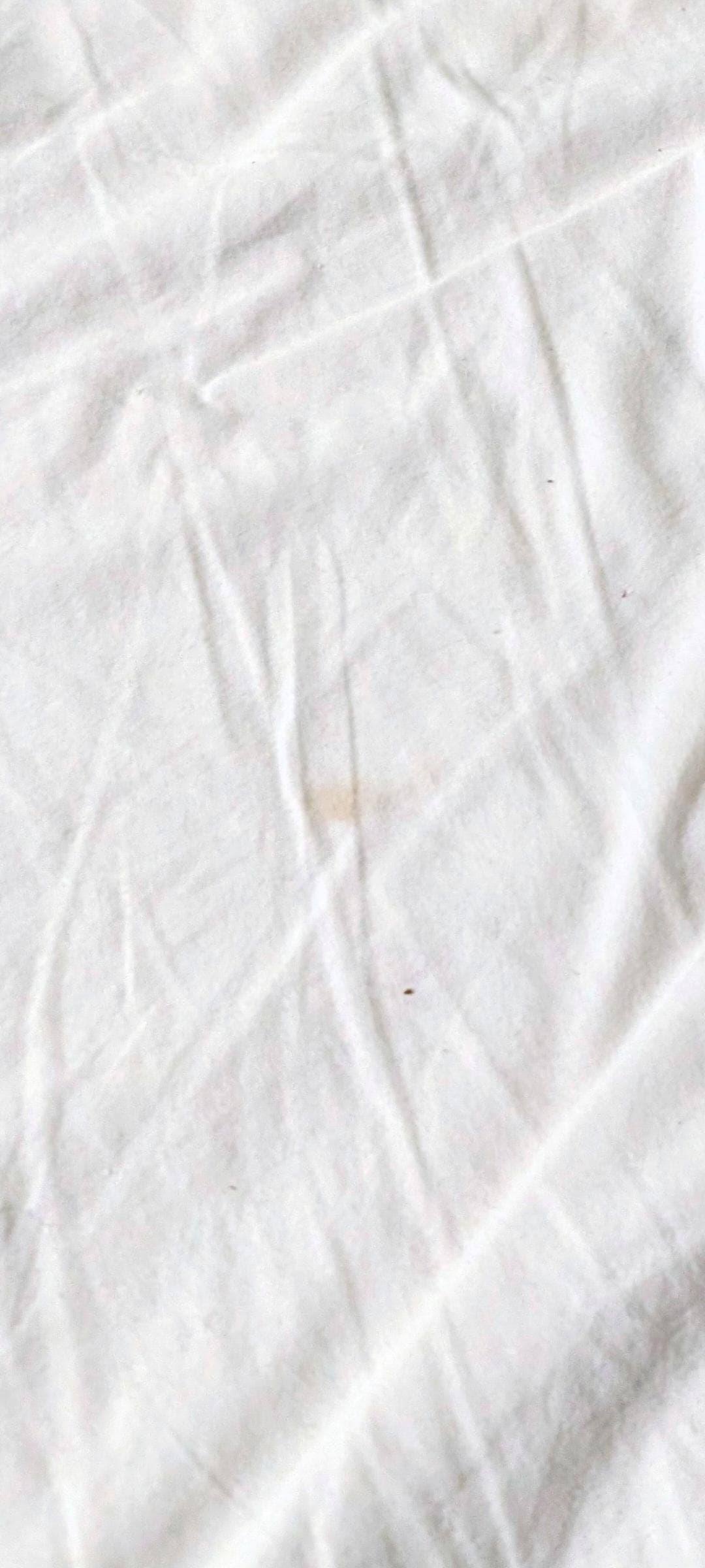 The sheet had a yellow stain.