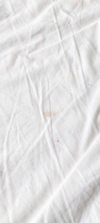 The sheet had a yellow stain.