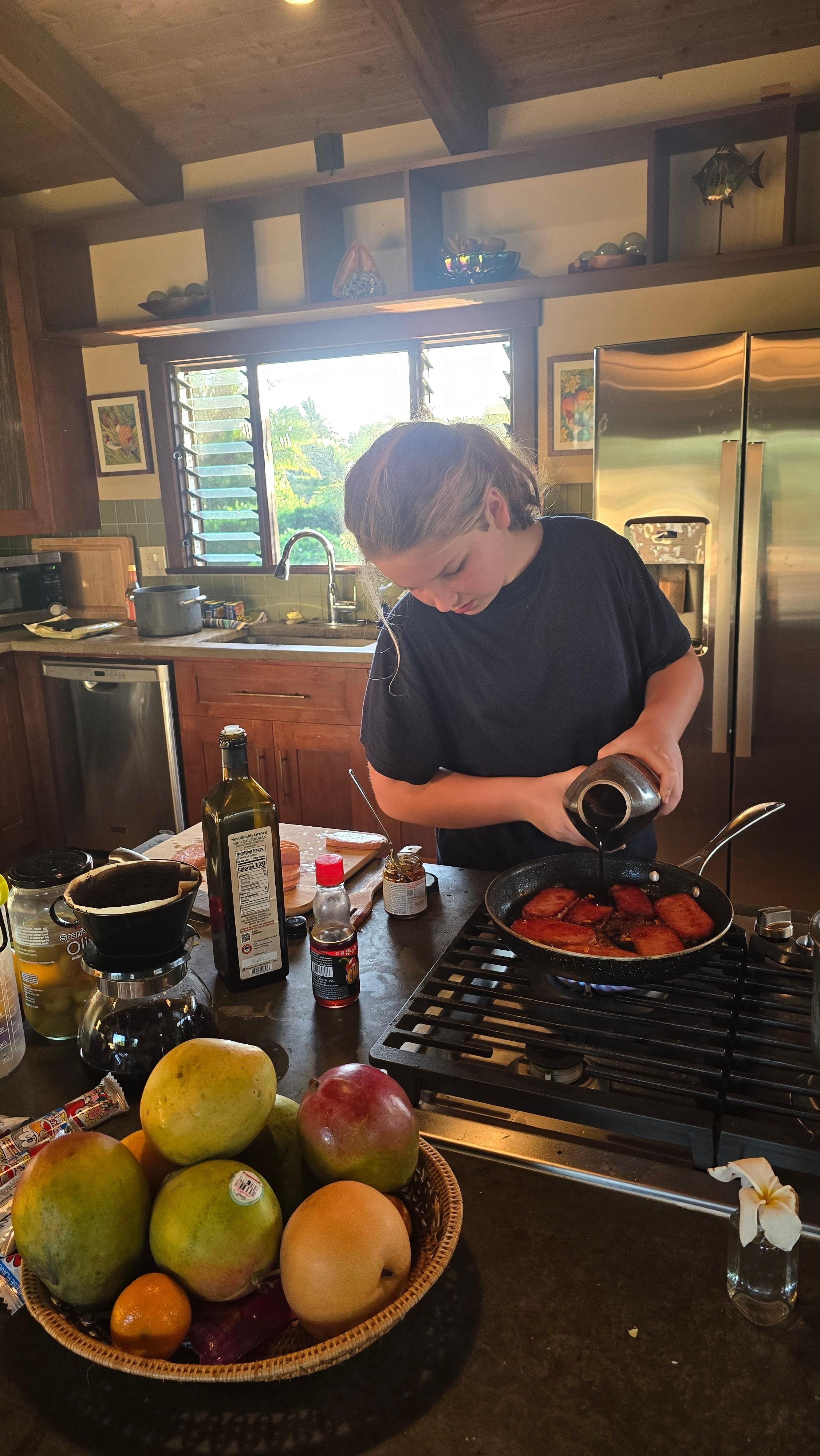 The youngest chef-in-the-making preparing Musubi for our seaside lunch