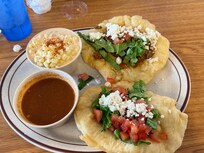 small local cafe. OUTSTANDING. Upon recommendation of the staff. Biriera Tacos made with Frybread.
