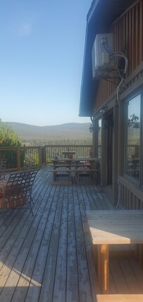 On the deck, outside from the kitchen