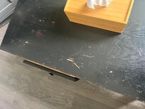 Mismatched furniture with scratches all over