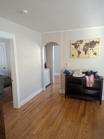 Looking out our room, the door on the left is the 2nd room and looking forward towards the kitchen area. You can see the washer and dryer there too.