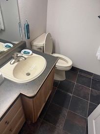 Bathroom is a little dated