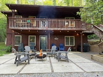 Close up of fire pit and front of house
