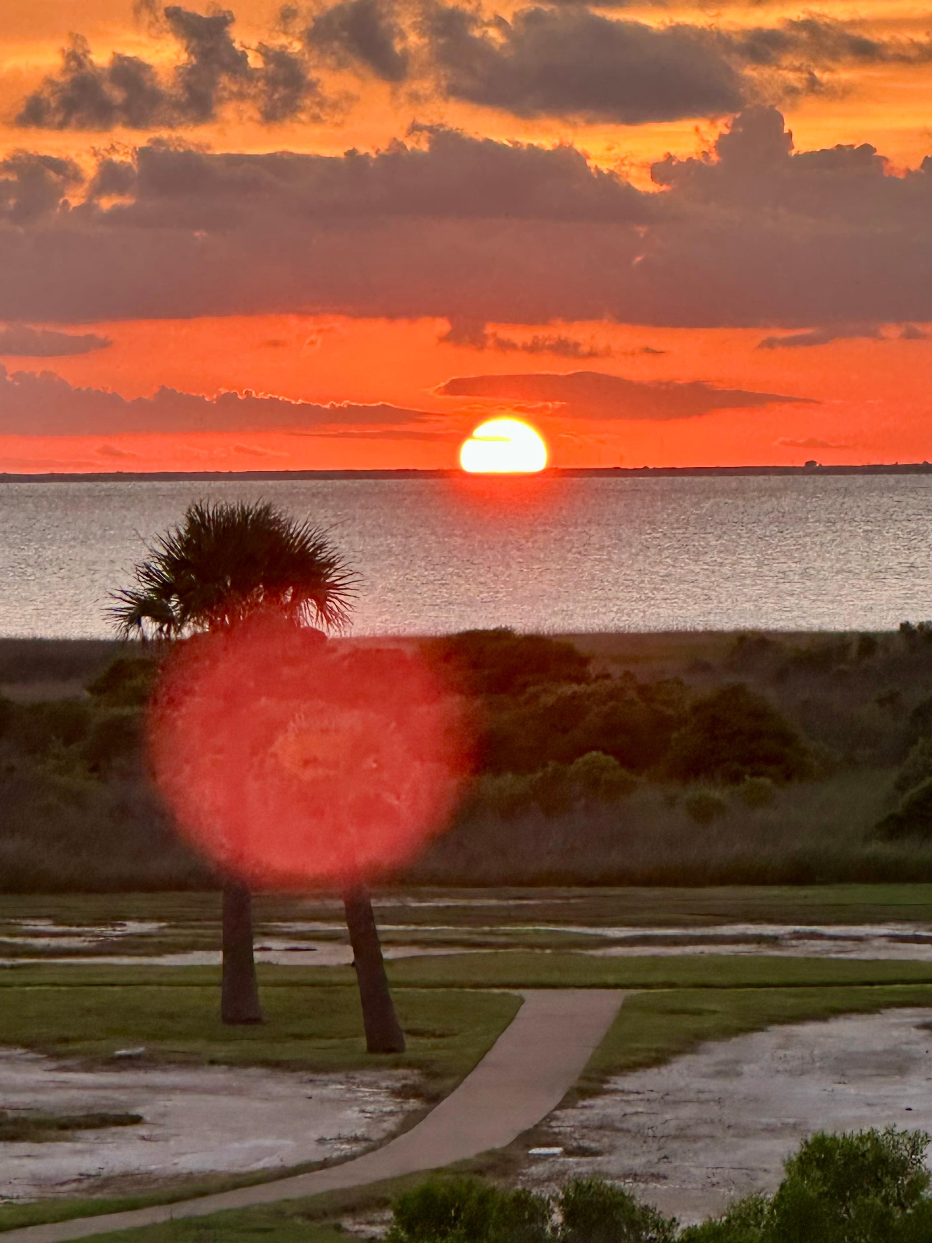 The sunset pics from the balcony each night of our stay.
