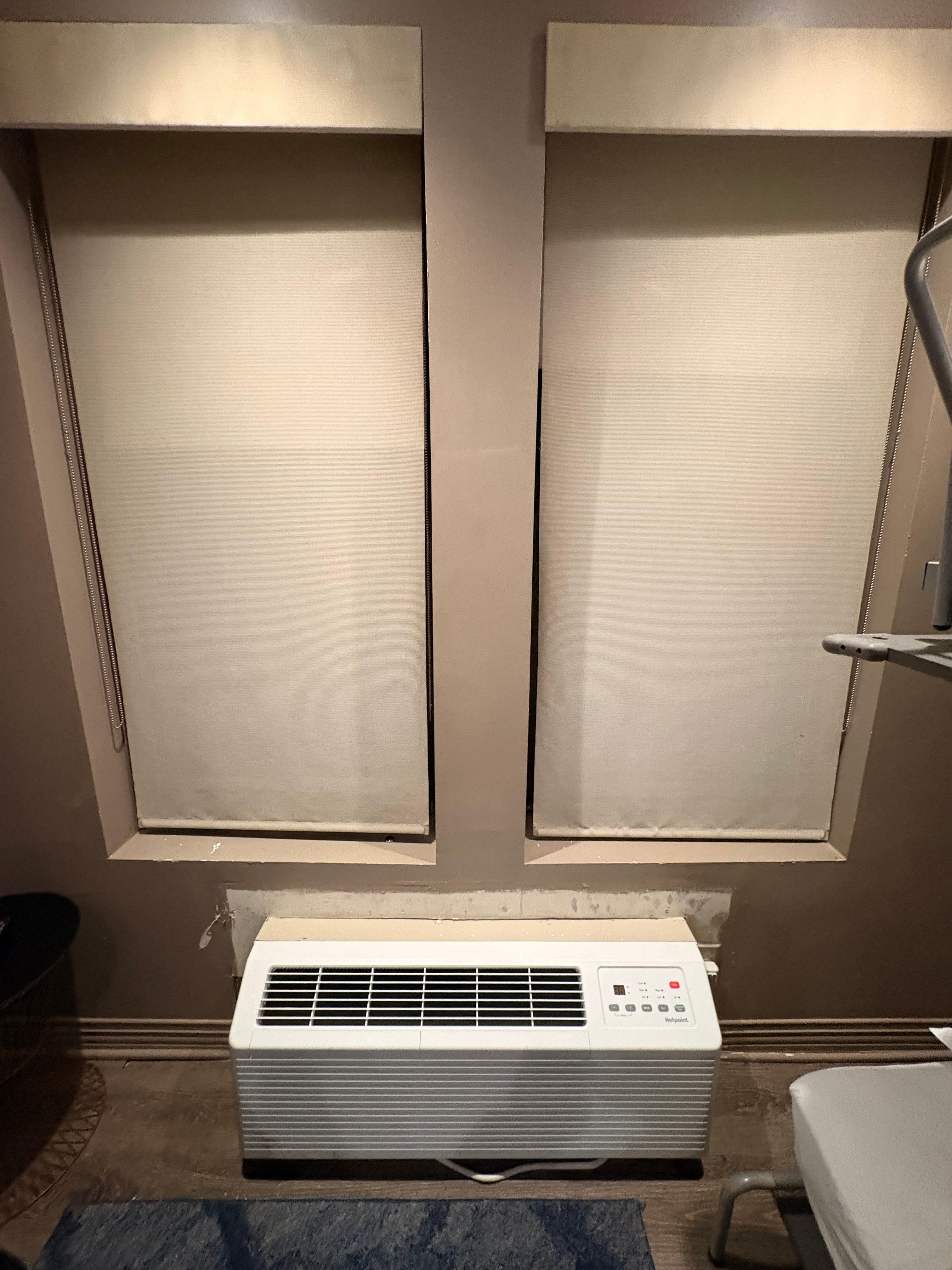 Windows have two shades, a block-out and a transparent one. As well as the unpainted wall.