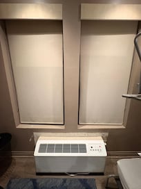 Windows have two shades, a block-out and a transparent one. As well as the unpainted wall.