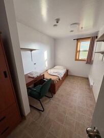 Bedroom. Towel and simple shower toiletries provided.