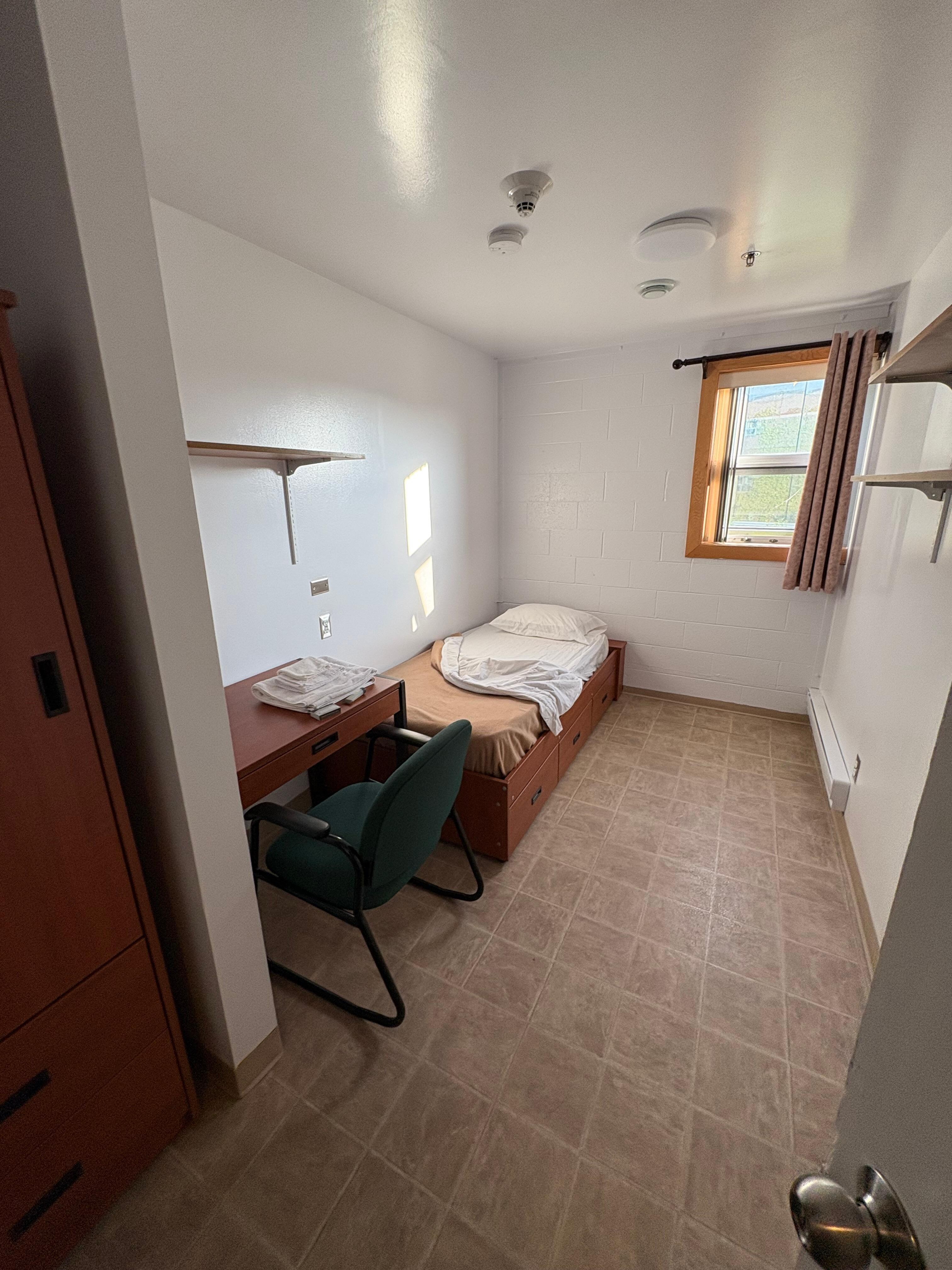 Bedroom. Towel and simple shower toiletries provided.