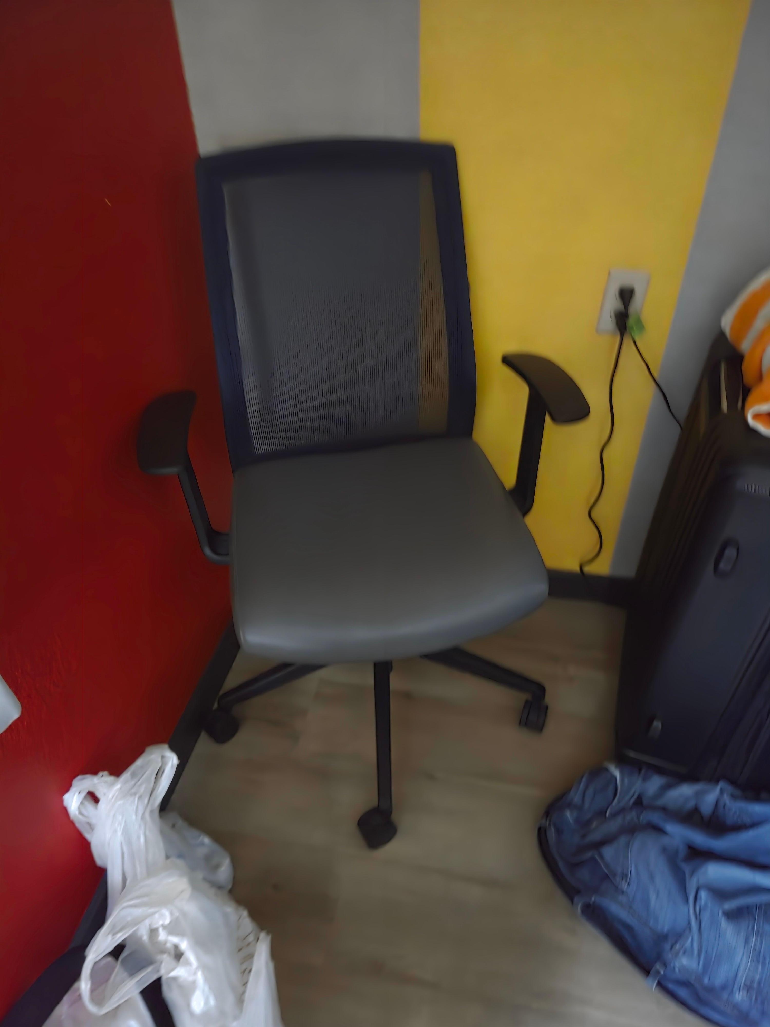 Random computer chair, no desk or table in room
