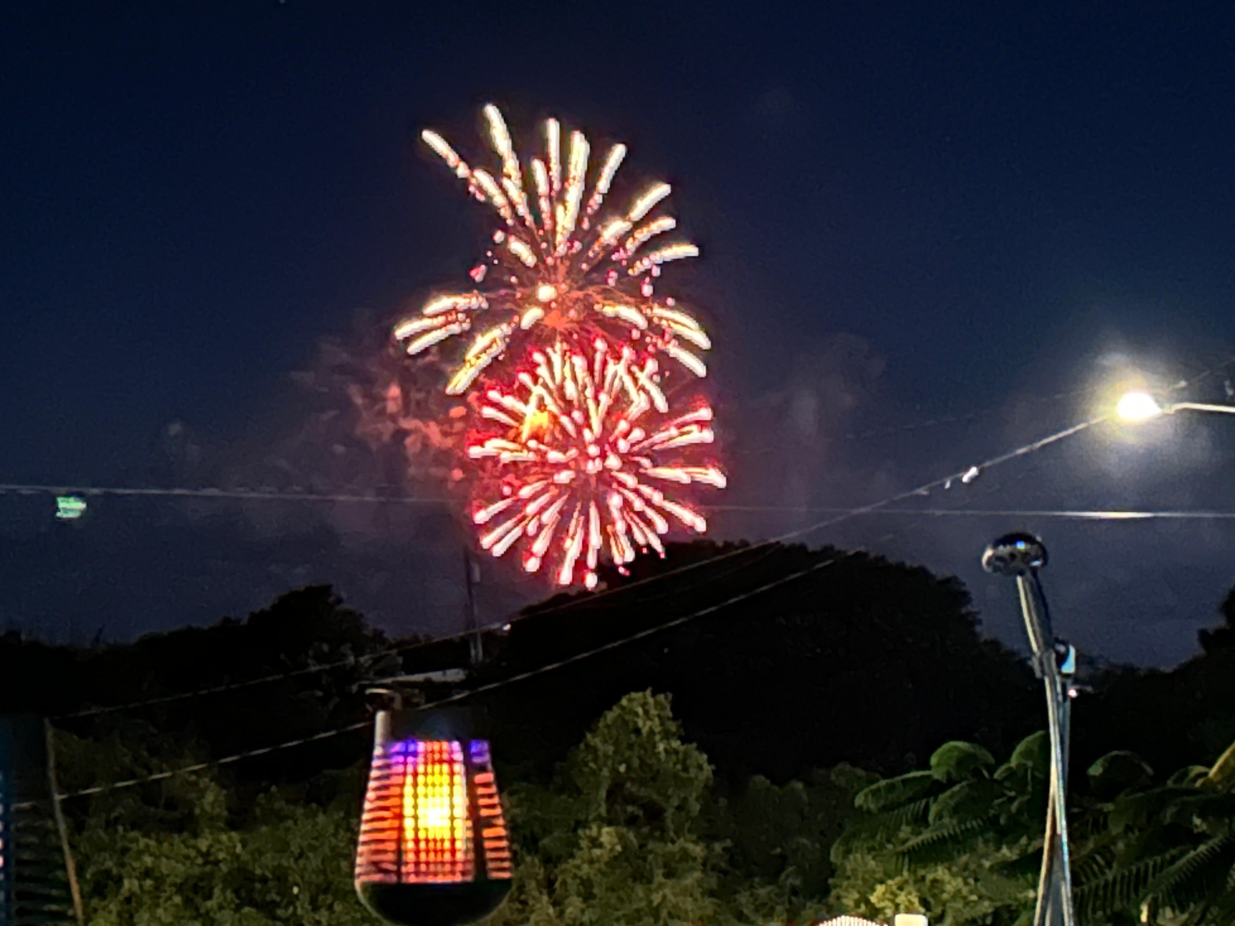 Fireworks over Frederiksted pier visible from the pool deck. 