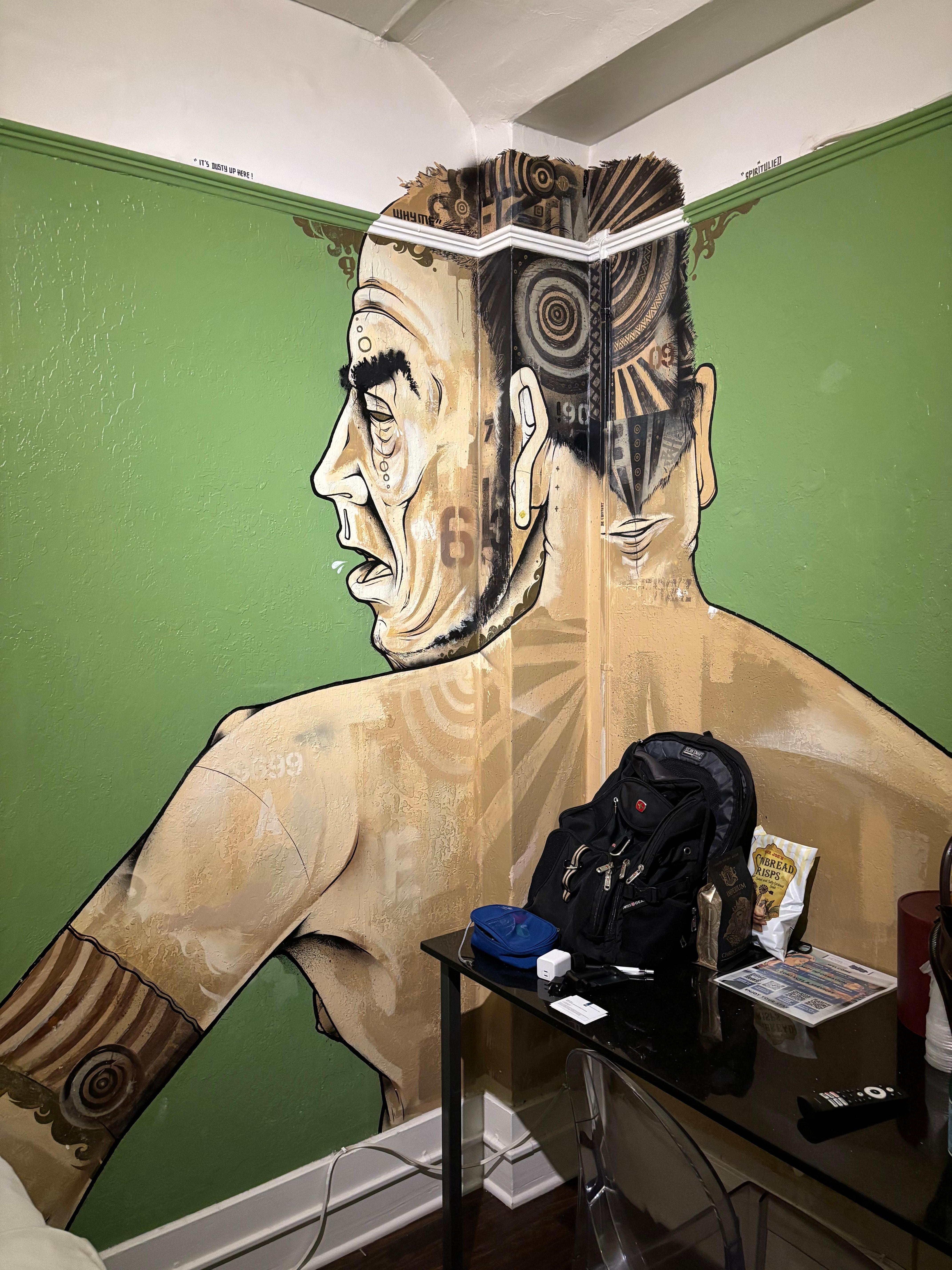 Imagine having to work and sleep in this room — ridiculous.