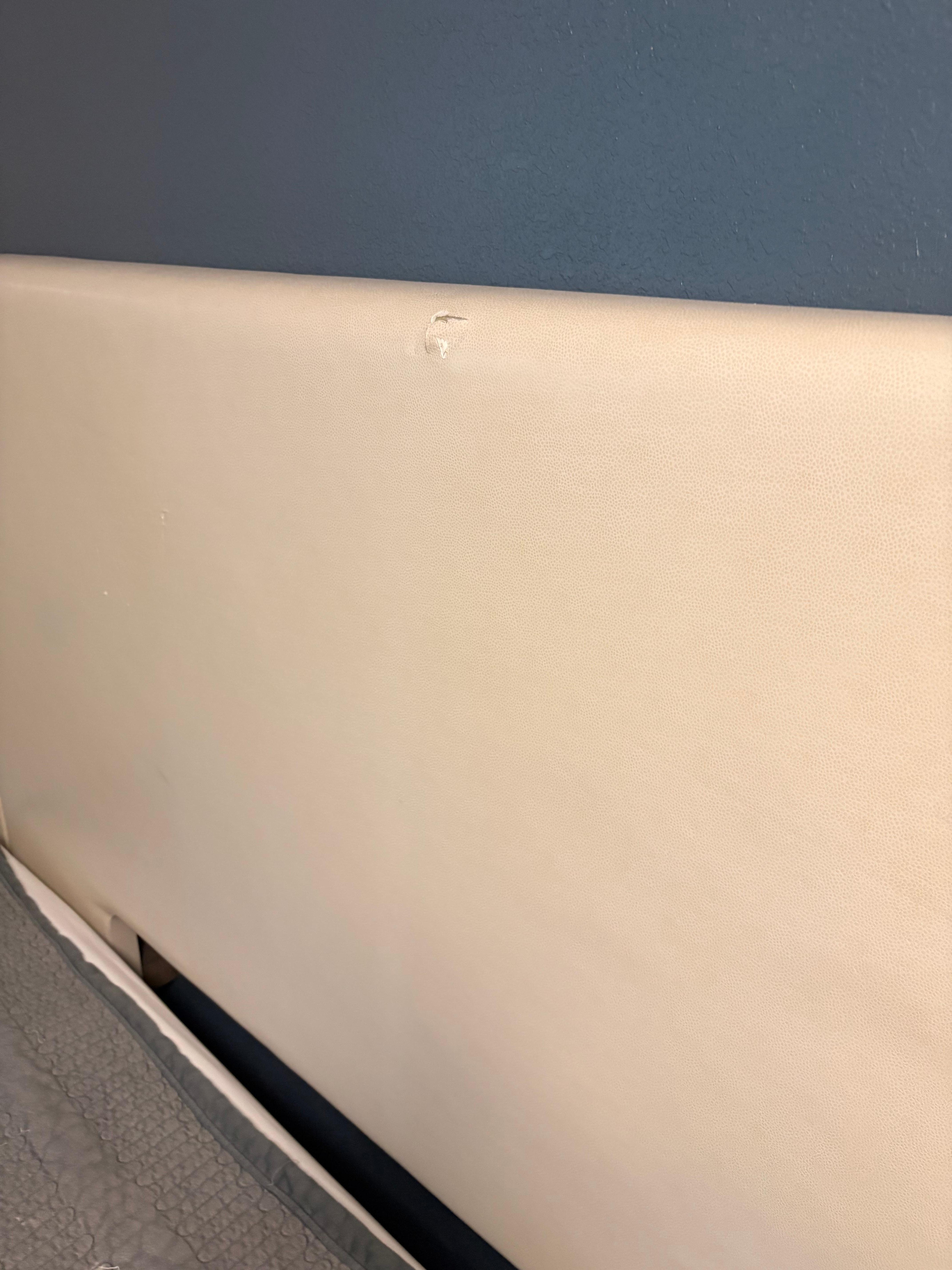 Headboard had rip as well as dirty. 