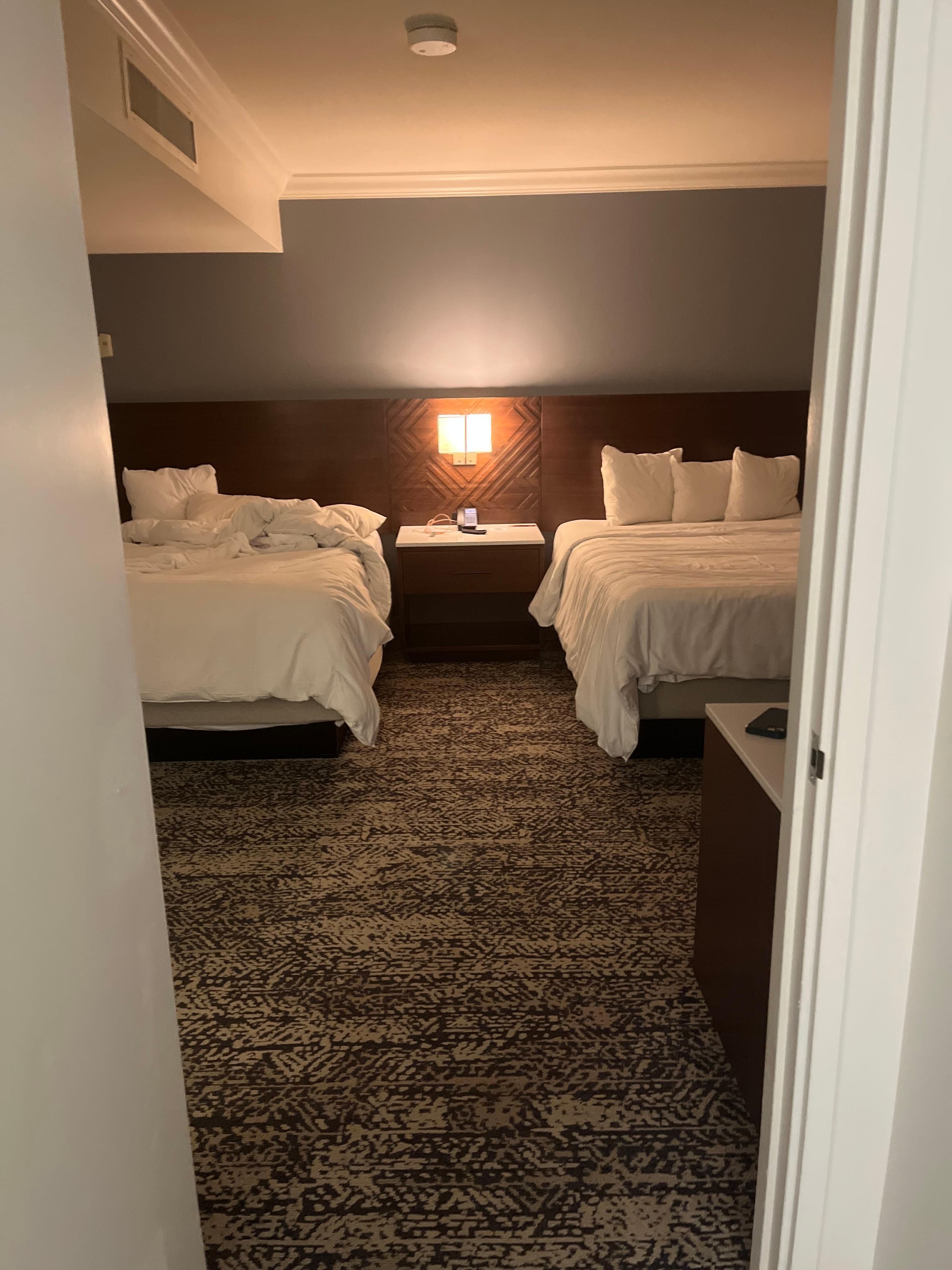 A picture of the very beautiful and very uncomfortable beds. Think, mattresses with springs that make noise and stab your back.