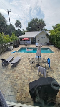 View of pool a d capital from main house.