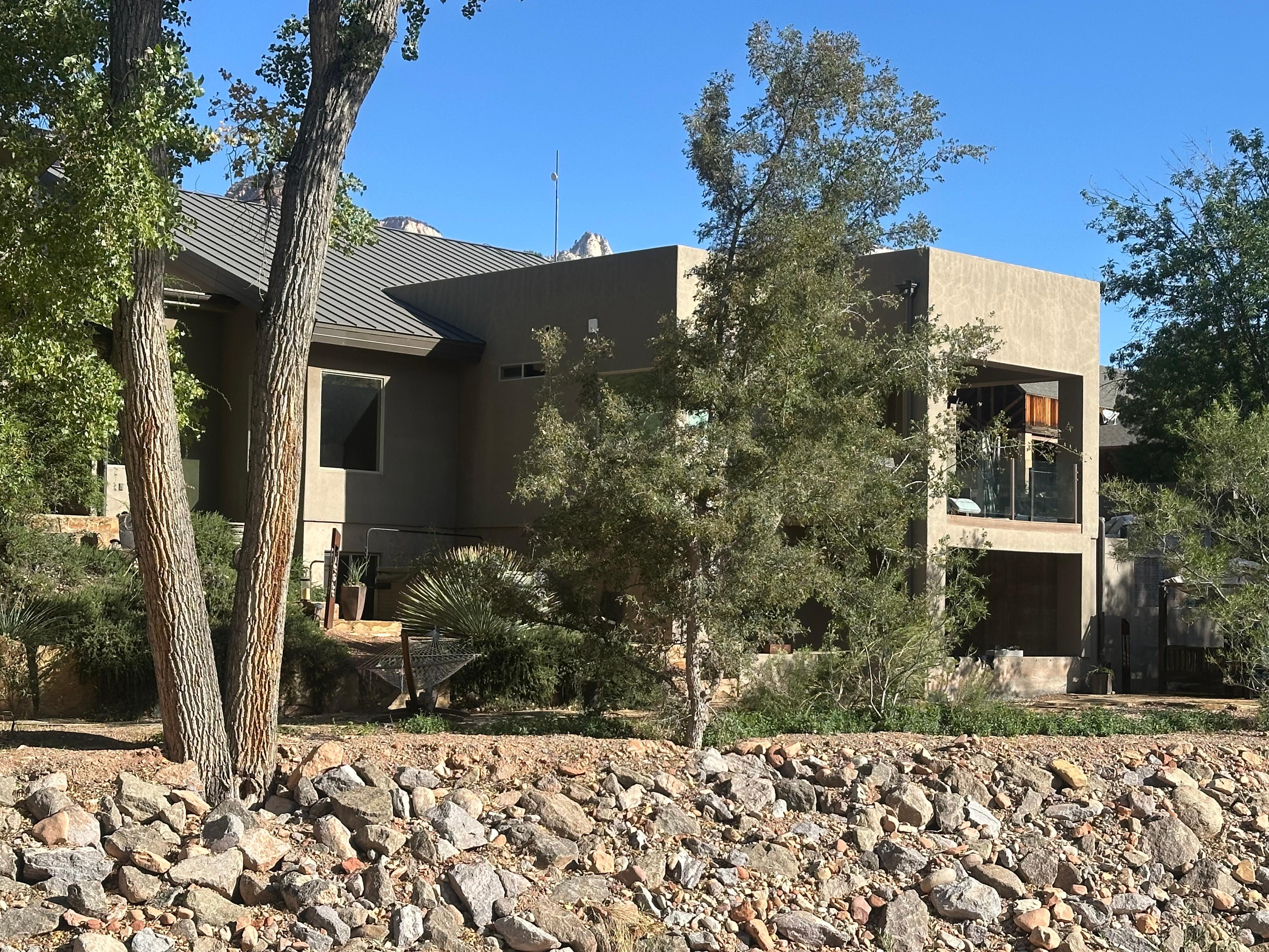 View of the back of the house from across the Virgin River.