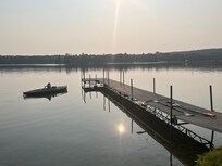 Really nice dock on a calm clean lake.