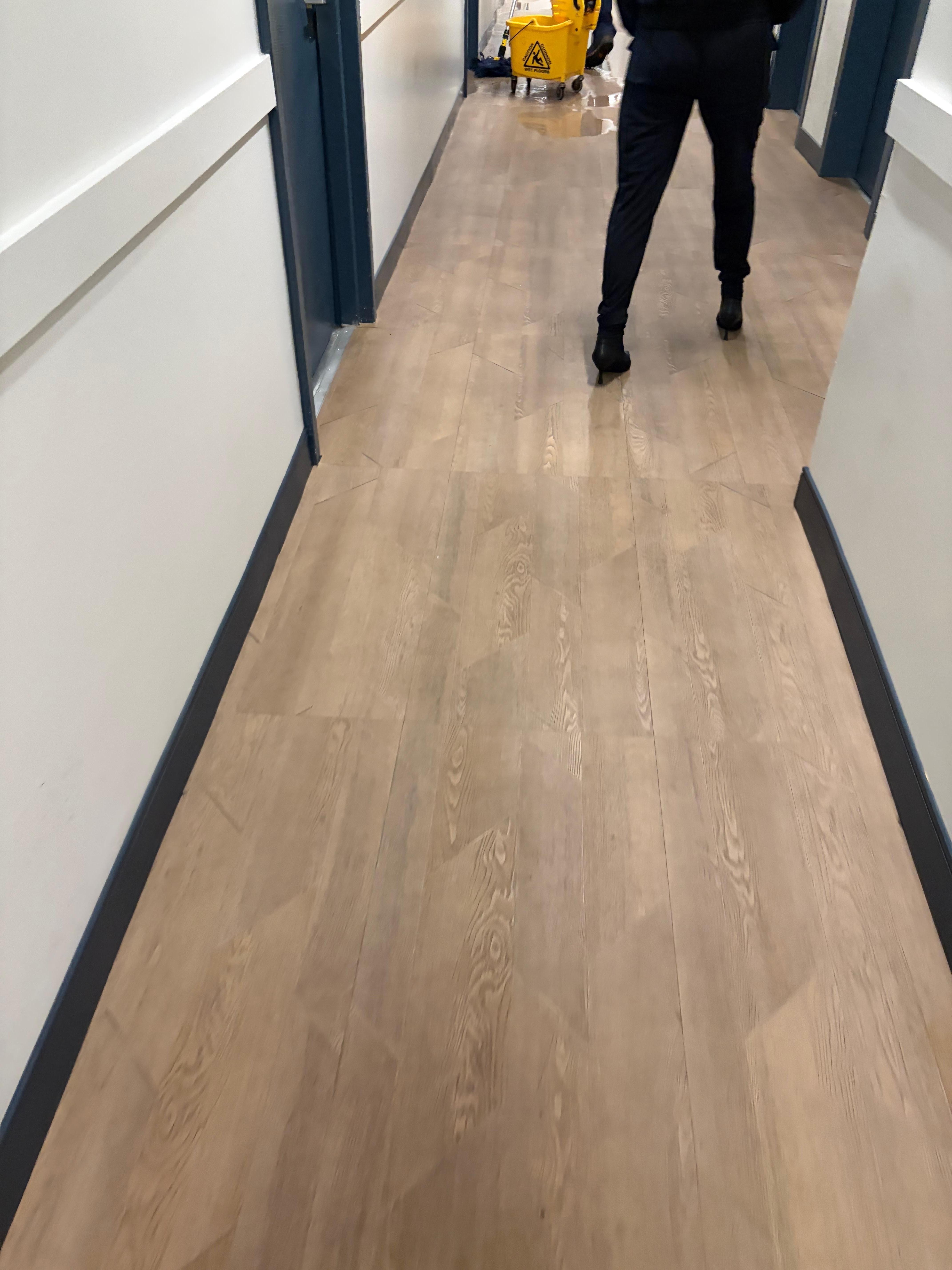 Neighbor unit flooded into hallway 