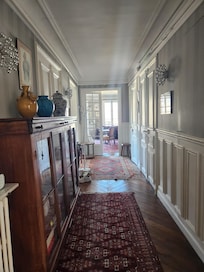 Hall from living room to kitchen bathrooms & bedroom