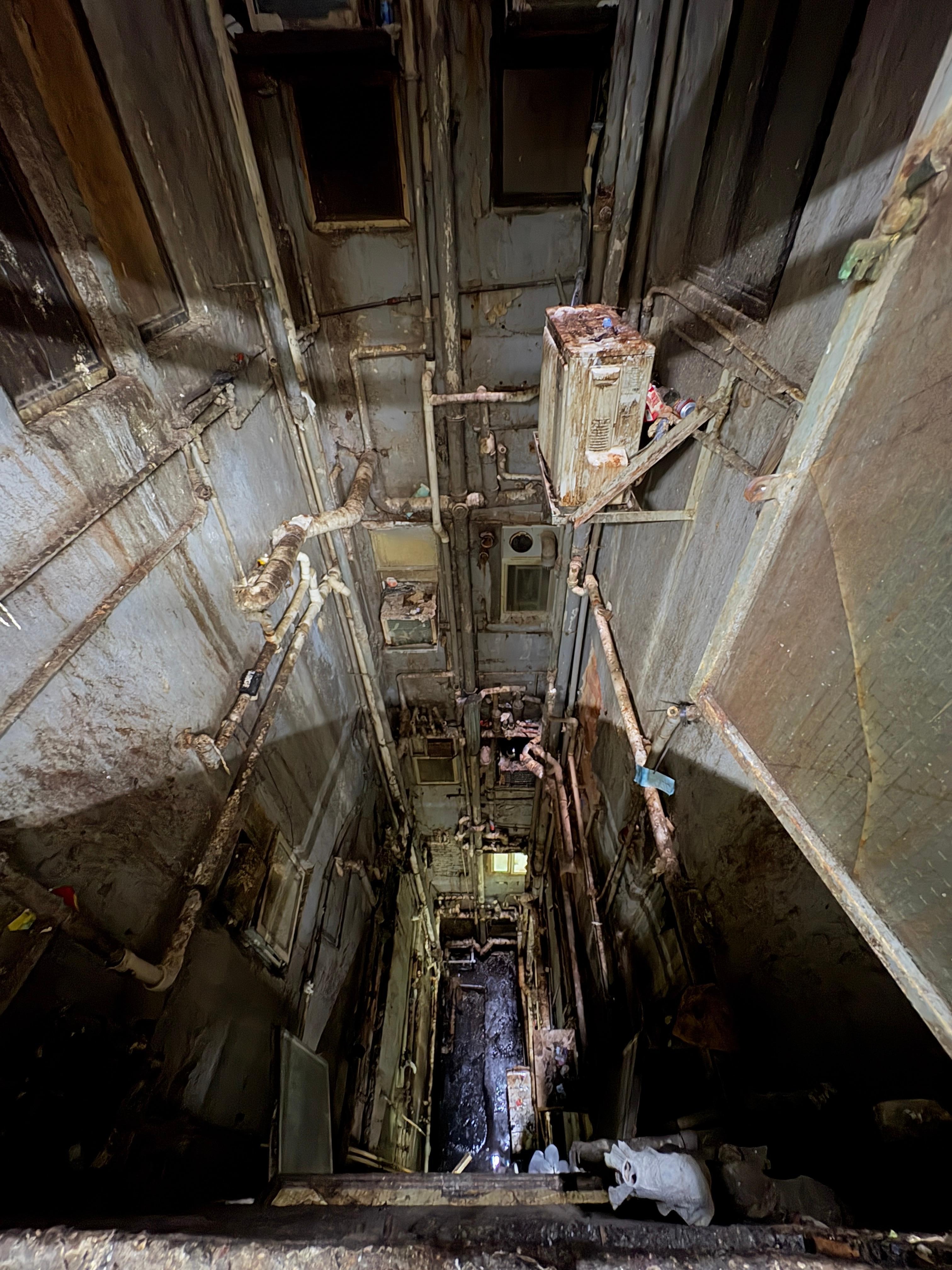 The old window shaft had a great Blade-runner vibe. Actually, the entire place did. Lots of shops and eateries on the lower floors.