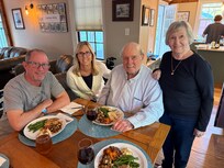 Enjoying Canadian Thanksgiving dinner with our parents.